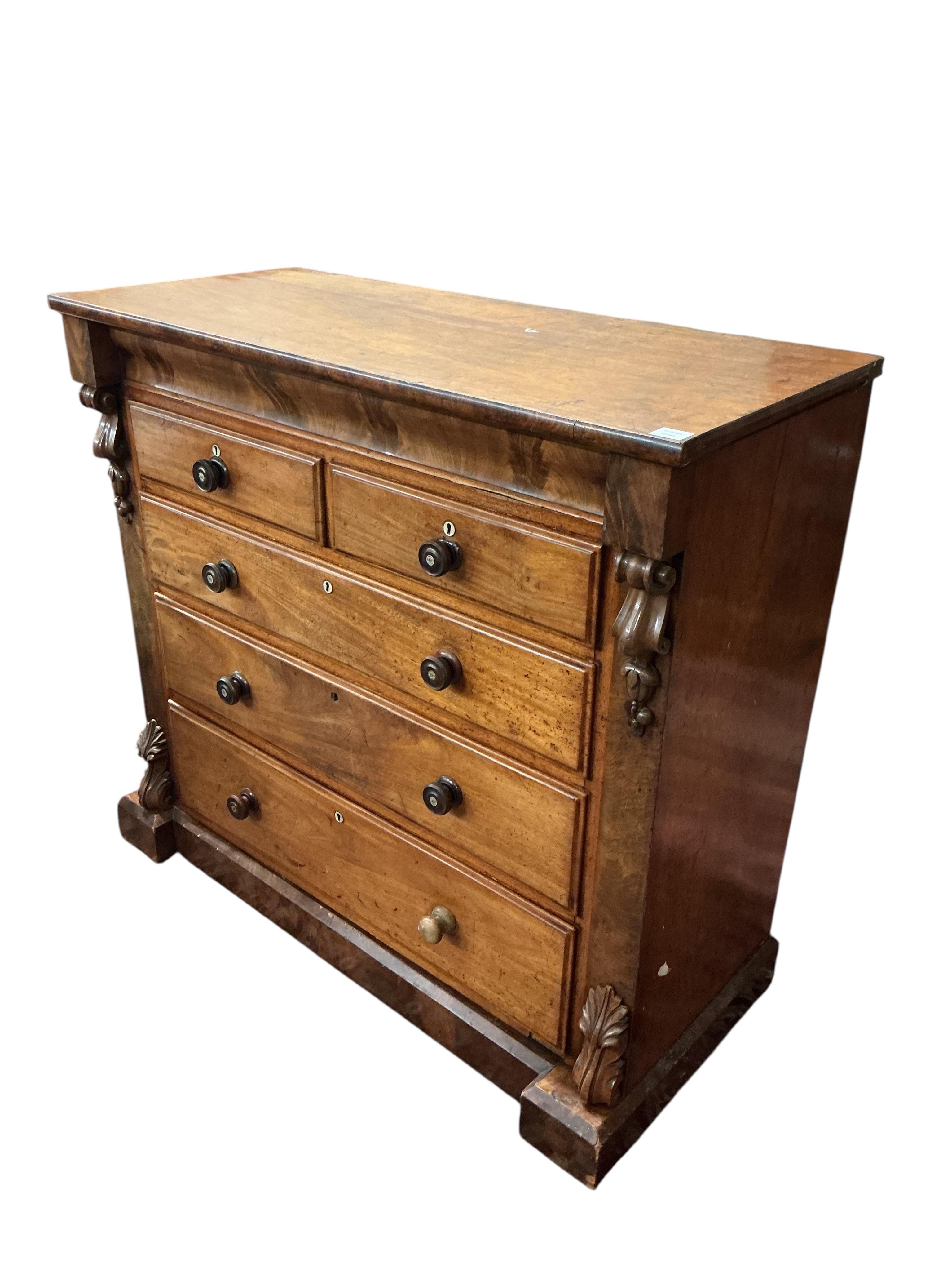 A Victorian mahogany chest of two short and three long drawers, inset with mother of pearl centred handles, width 127cm, depth 57cm, height 120cm
